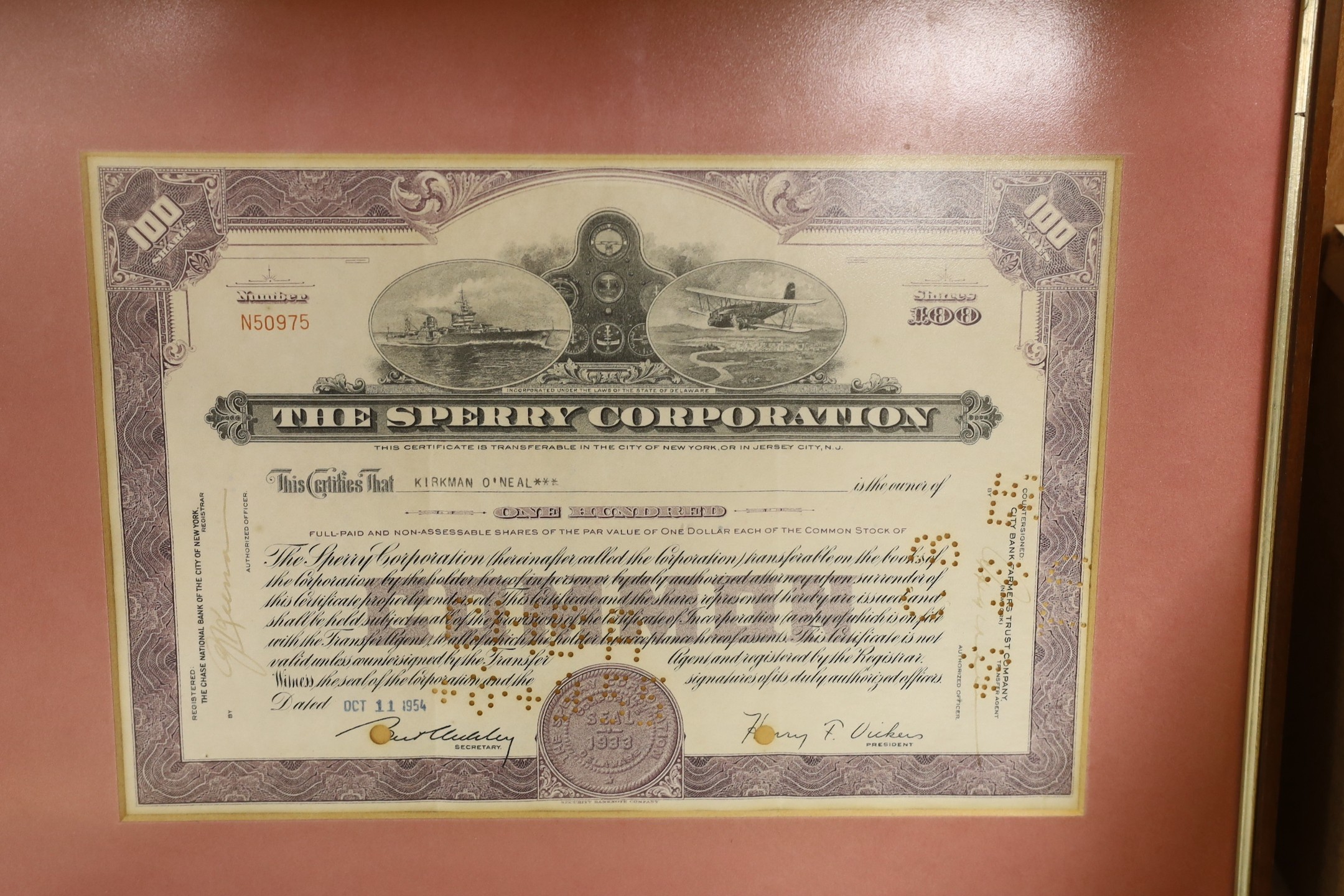 Four framed Share Certificates: one Siberian, two USA and one Spainish.